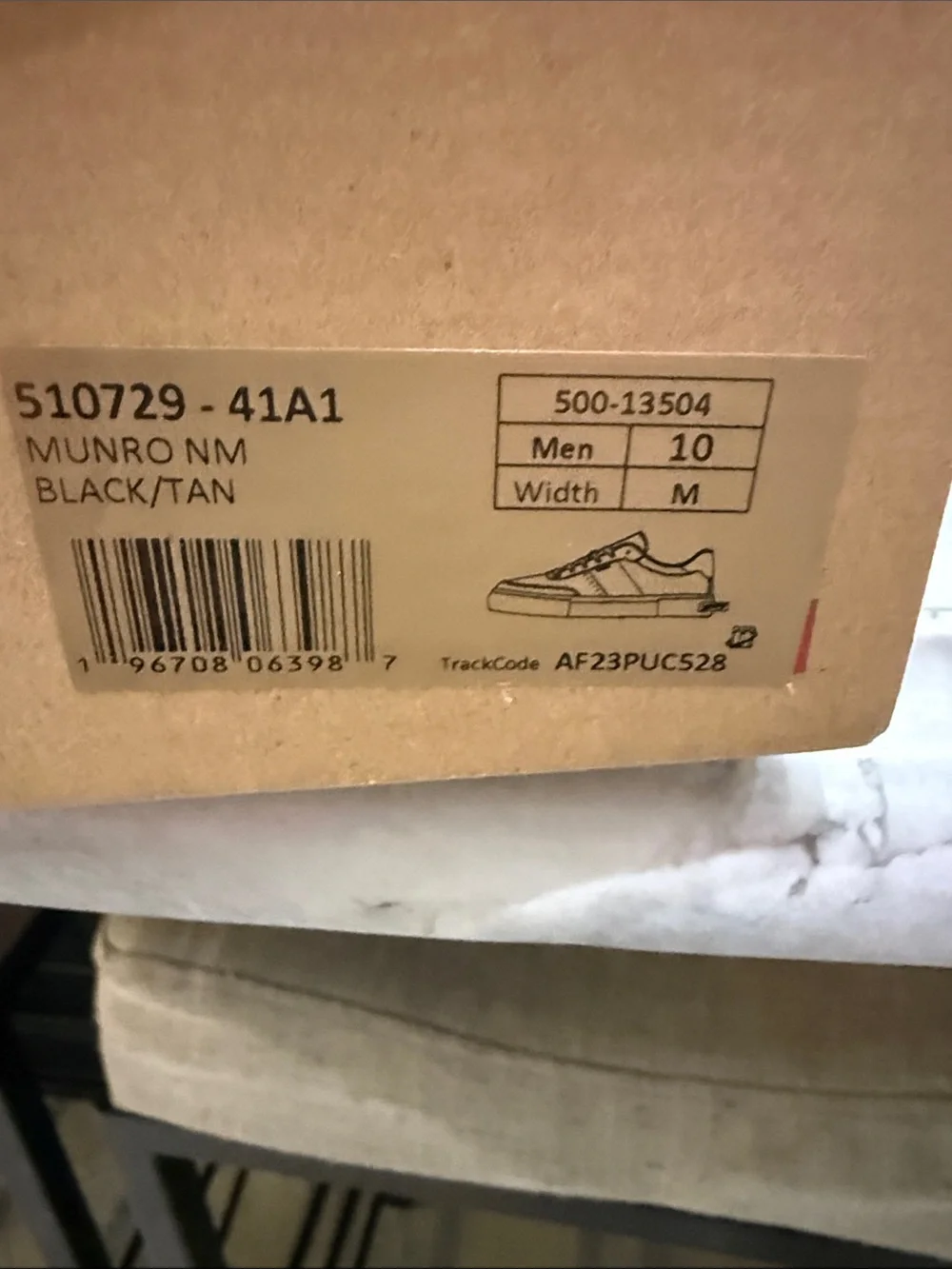 Levi's Men's Black Sneakers with Brown Heel Accent and White Sole